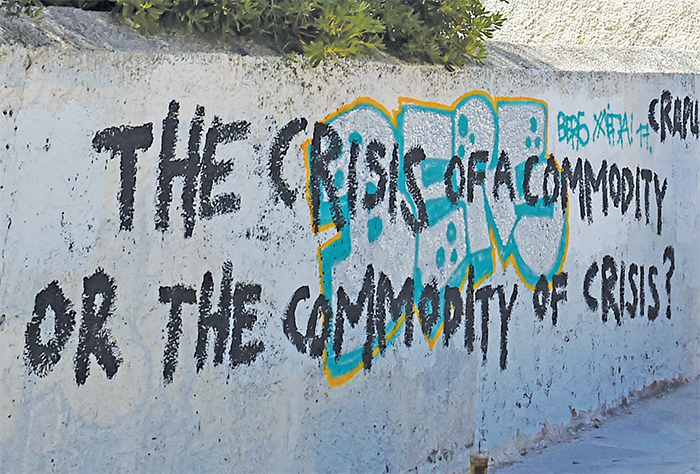 雅典Dionysiou Areopagitou街道墙壁上的涂鸦，2017年4月9日. 摄影：Louisa Gouliamaki/Getty Images.