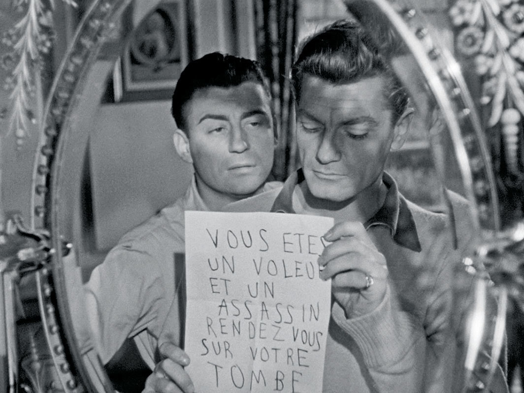 让·科克托，《奥菲斯》，1950，35毫米，黑白，有声，95分；赫尔必思（弗朗索瓦·佩里埃饰）和奥菲斯（让·马雷饰）.