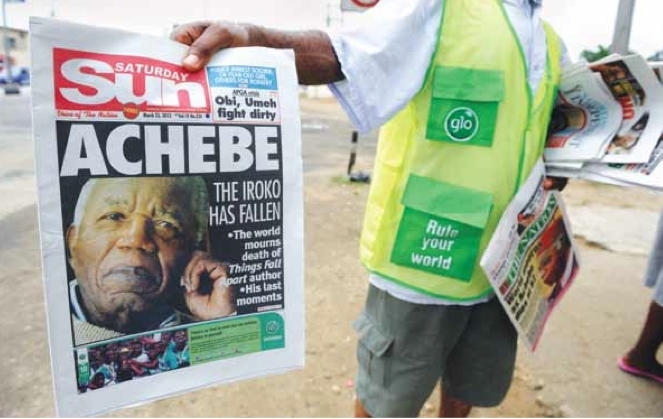 报贩，尼日利亚卡拉巴尔街头，2013年3月23日。摄影: pius utomi ekpei/afp/getty images。
