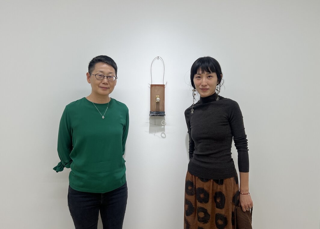 魔金石负责人潘宝会和艺术家经傲.